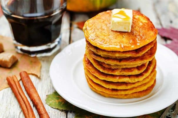 EASY FLUFFY Pumpkin Pancakes recipe! These delicious extra fluffy pancakes made from scratch are low carb and packed with protein (1/2 cup pumpkin!). They make a healthy substitution instead of buttermilk pancakes. My family considers them "the best pumpkin pancakes in the world!".