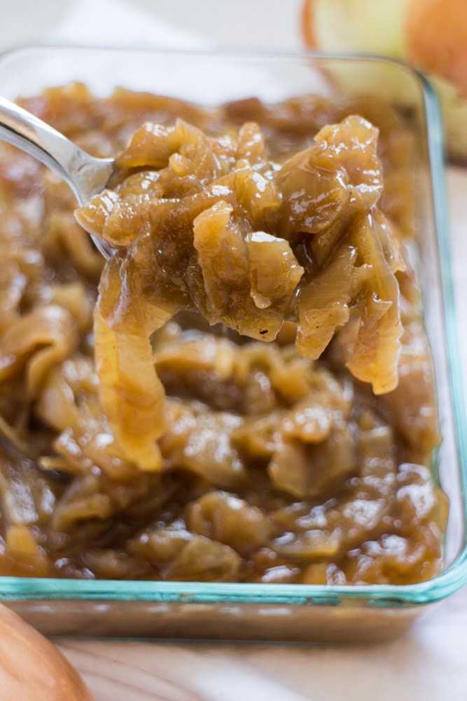 Easy Slow Cooker Caramelized Onions recipe that is ready in 5 hours.  This quick 4 ingredient recipe is the best and will make your mouth water! Step by step instructions on how to make these sweet onions in the crockpot. 