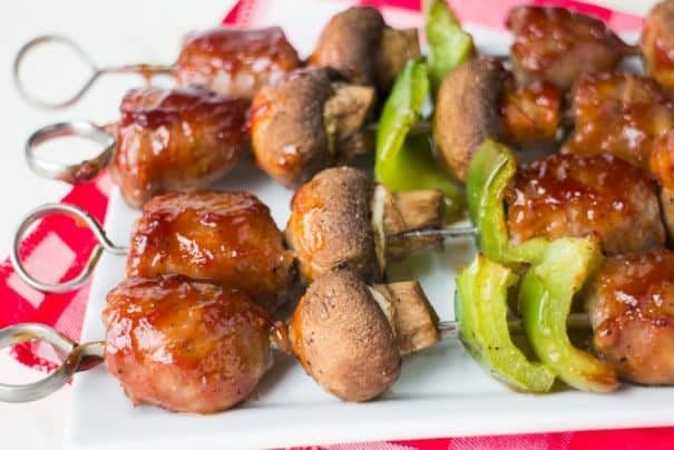 How to make BBQ Sausage Kabobs in the oven! This easy healthy recipe makes Oven Baked Sausage with mushrooms and peppers on sticks in the oven, no grill is needed! 