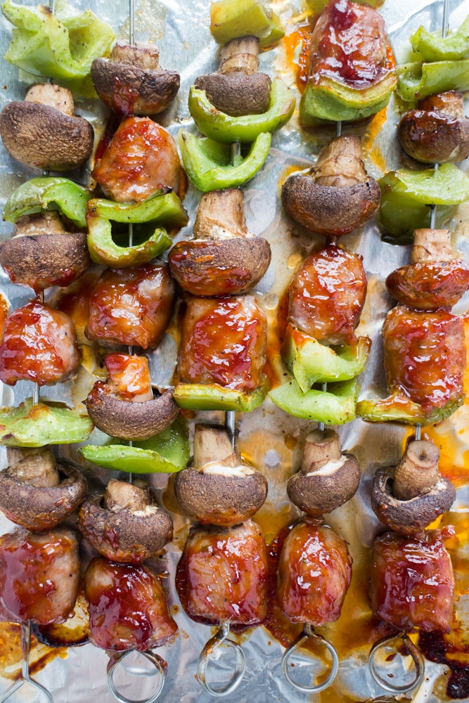 How to make BBQ Sausage Kabobs in the oven! This easy healthy recipe makes Oven Baked Sausage with mushrooms and peppers on sticks in the oven, no grill is needed! 