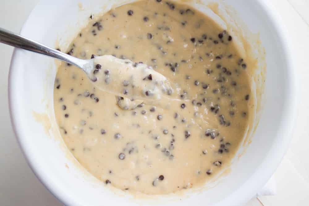donut batter being mixed with spoon