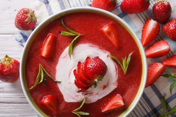 Eat HEALTHY with this Strawberry Soup! This simple Summer time meal recipe uses fresh strawberries and yogurt to make a creamy chilled strawberry soup!  Each serving is only 205 calories!