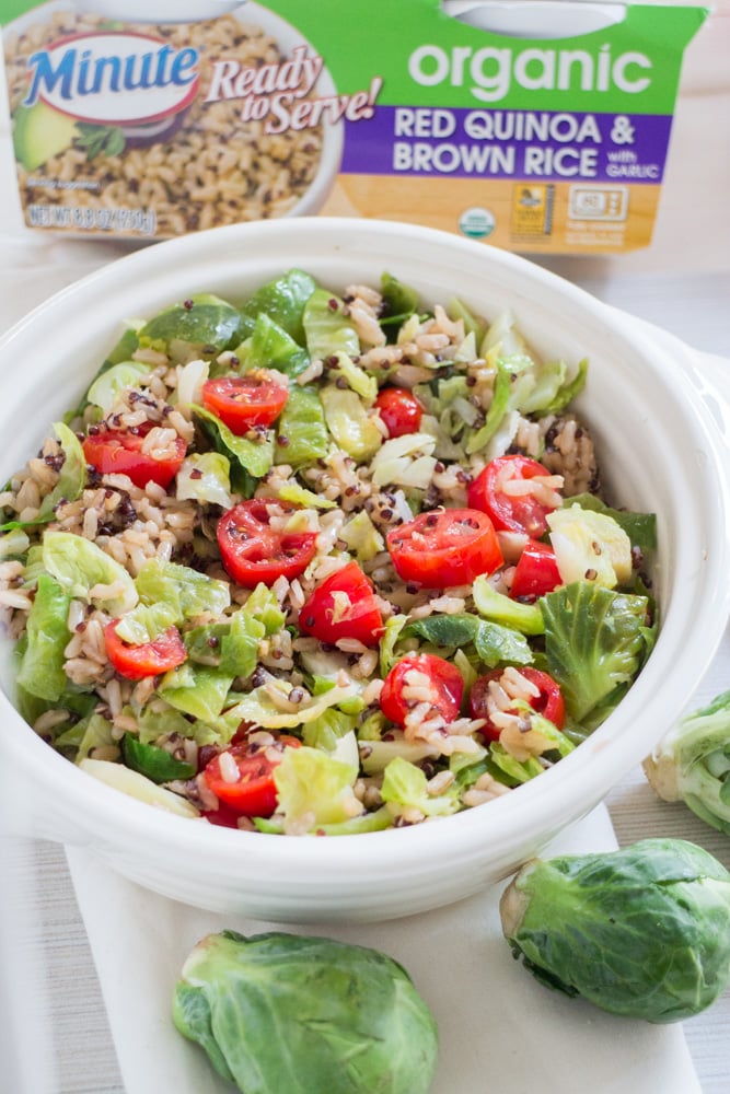 10 MINUTE Brussels Sprouts Quinoa Rice dish! This EASY clean eating recipe is made with Minute Rice and served with fresh Brussels Sprouts and cherry tomatoes! This healthy meal is gluten free and vegetarian - make it for a work lunch or easy dinner! 
