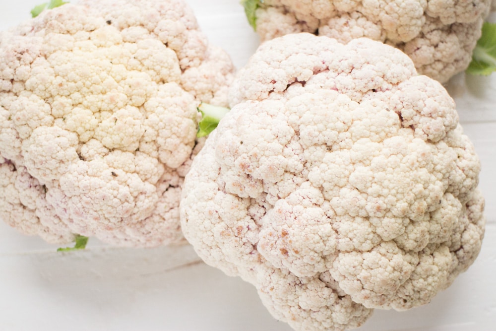 After years of failing at growing cauliflower we switched to a new variety and grew over 20 pounds of cauliflower! Learn how we grow cauliflower from seeds that can withstand Summer heat and result in a big cauliflower harvest!