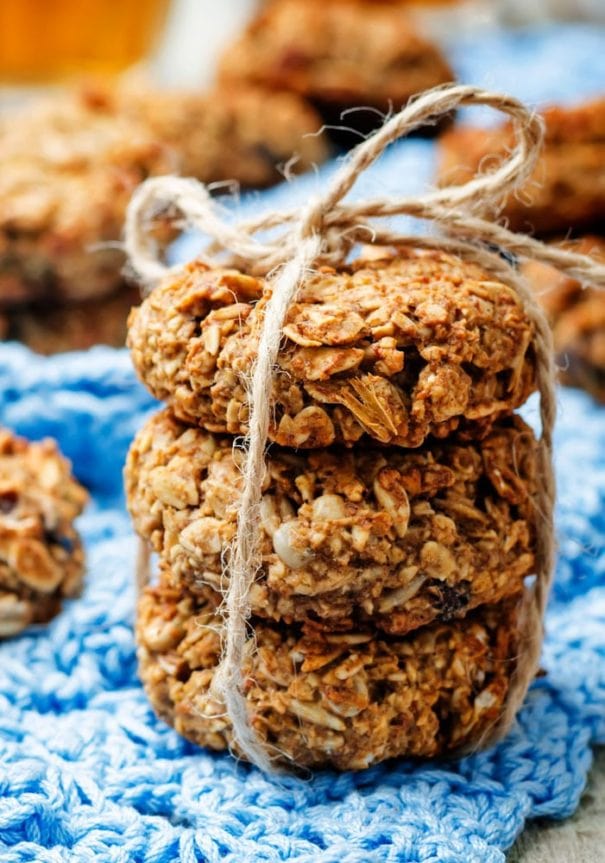 Banana Oat Cookies that taste just like banana bread! This healthy, easy to make recipe makes 3 dozen cookies filled with oatmeal, walnuts, and chocolate chips! These cookies are soft and packed with protein and fiber to make the best breakfast or dessert!