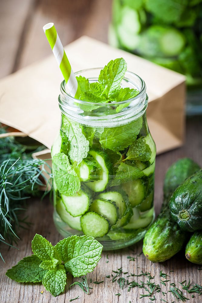 CUCUMBER PEPPERMINT Tea is my favorite Summer drink! This homemade cup of green tea includes cucumbers, peppermint, honey and a splash of lemon juice to make a healthy and fresh drink. You can drink it hot or iced. The health benefits of this tea are great so I love drinking it every morning!