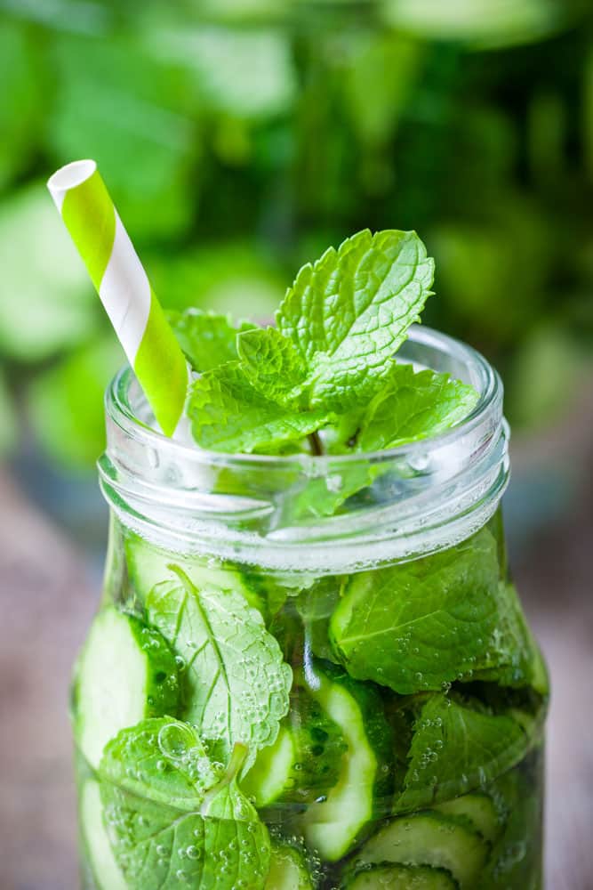 CUCUMBER PEPPERMINT Tea is my favorite Summer drink! This homemade cup of green tea includes cucumbers, peppermint, honey and a splash of lemon juice to make a healthy and fresh drink. You can drink it hot or iced. The health benefits of this tea are great so I love drinking it every morning!