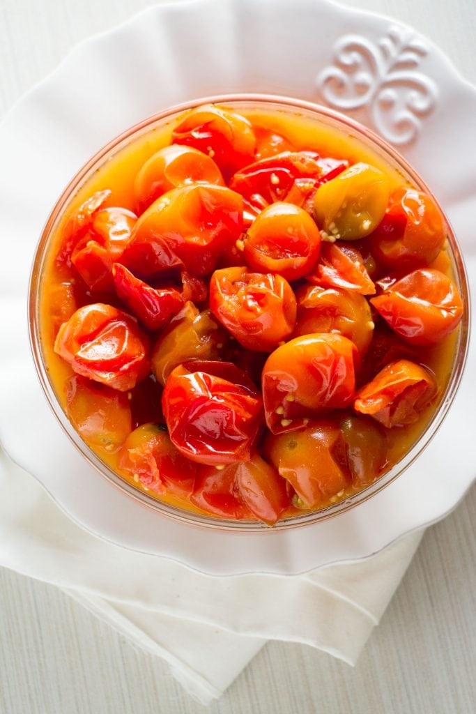 slow cooker cherry tomatoes in white bowl
