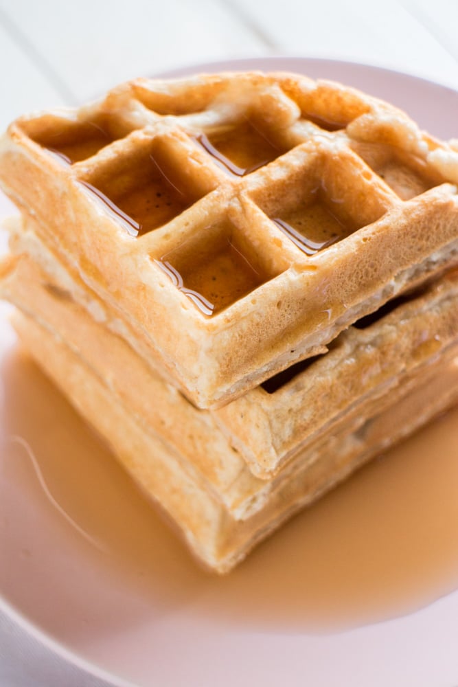 No Butter Fluffy Waffles recipe calls for applesauce instead of butter making this a healthy breakfast meal! I love these homemade waffles because they're so easy to make and so fluffy!