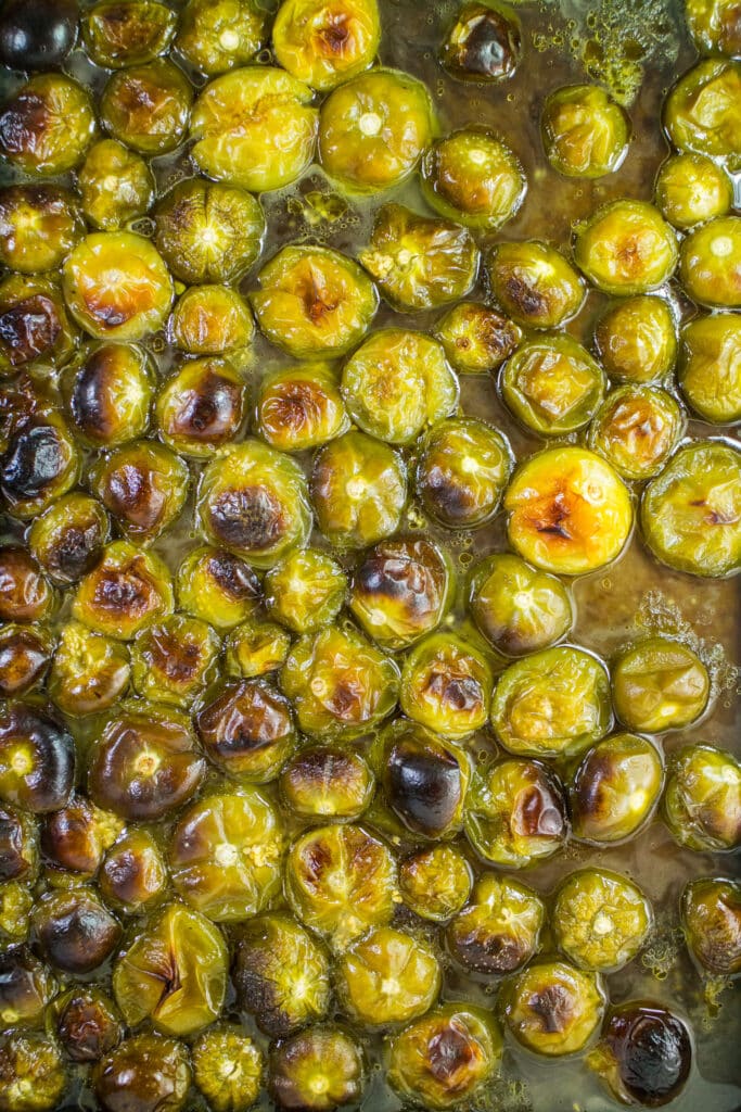 baked browned tomatillos in pan.