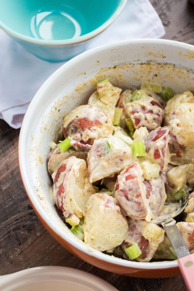 creamy potato salad made with ranch dressing in bowl. 