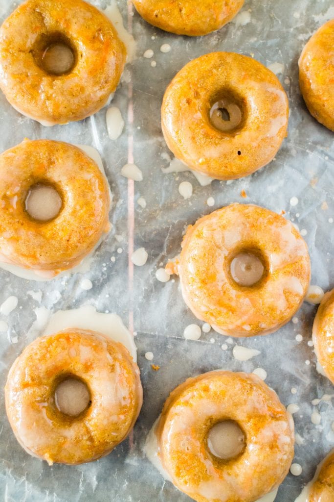 top down look at glazed carrot donuts.