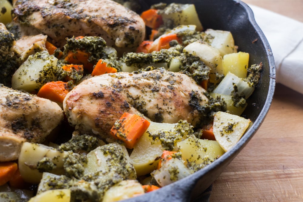 Cast Iron Chicken With Mint Chutney - this is a full meal recipe with vegetables!  This dinner dish uses fresh mint on baked chicken breasts, along with carrots, potatoes and onions!  Your entire family will love this healthy one skillet pan meal!