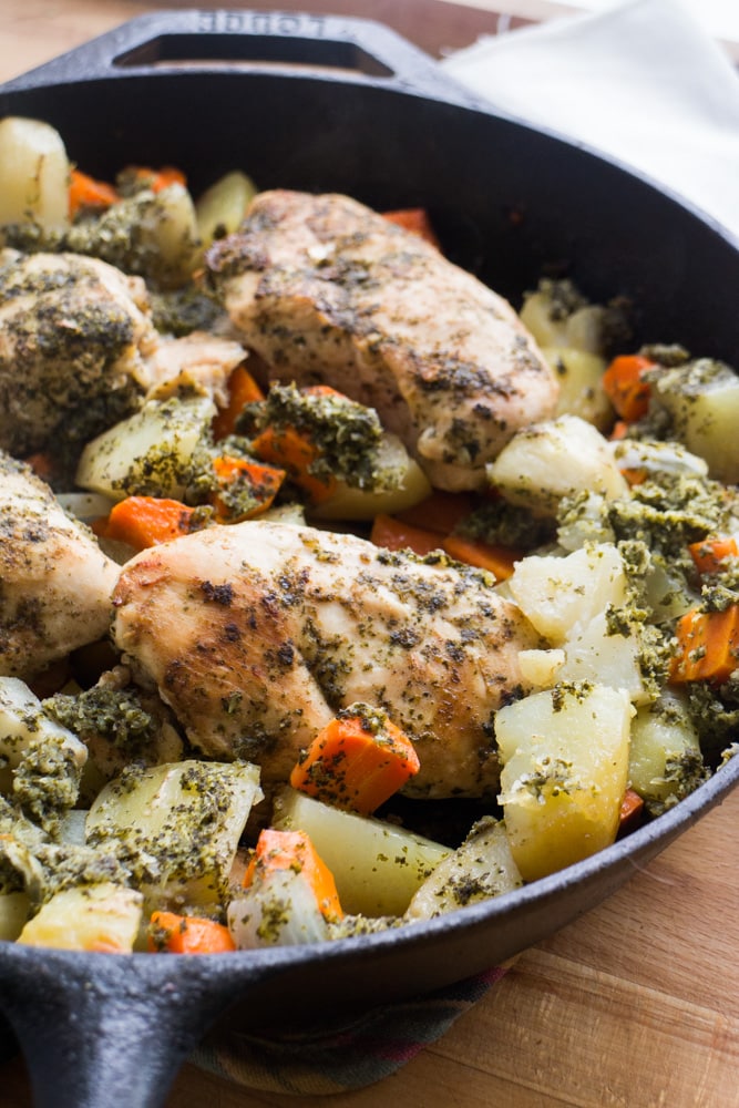 Cast Iron Chicken With Mint Chutney - this is a full meal recipe with vegetables!  This dinner dish uses fresh mint on baked chicken breasts, along with carrots, potatoes and onions!  Your entire family will love this healthy one skillet pan meal!