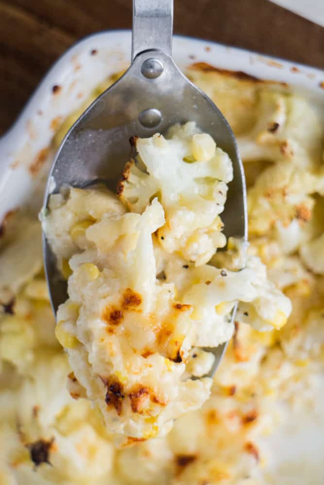 cheesy cauliflower casserole on spoon