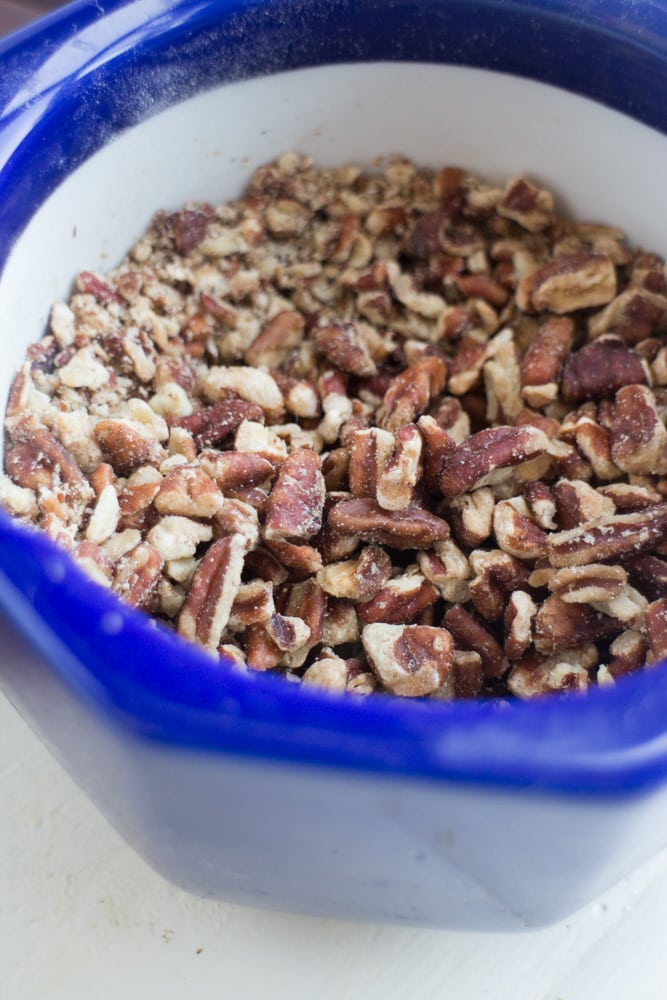 EASY White Chocolate Toffee Recipe with rainbow sprinkles! You're going to love this sticky homemade candy that has a base of crushed up pecans. Cut into squares or break up into bark! 