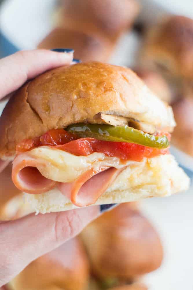 ITALIAN Ham and Turkey Sliders with ROASTED Vegetables on Hawaiian Sweet Rolls! This mini sandwich recipe is so easy to make and makes the perfect meal for dinner, potlucks and party finger foods! 