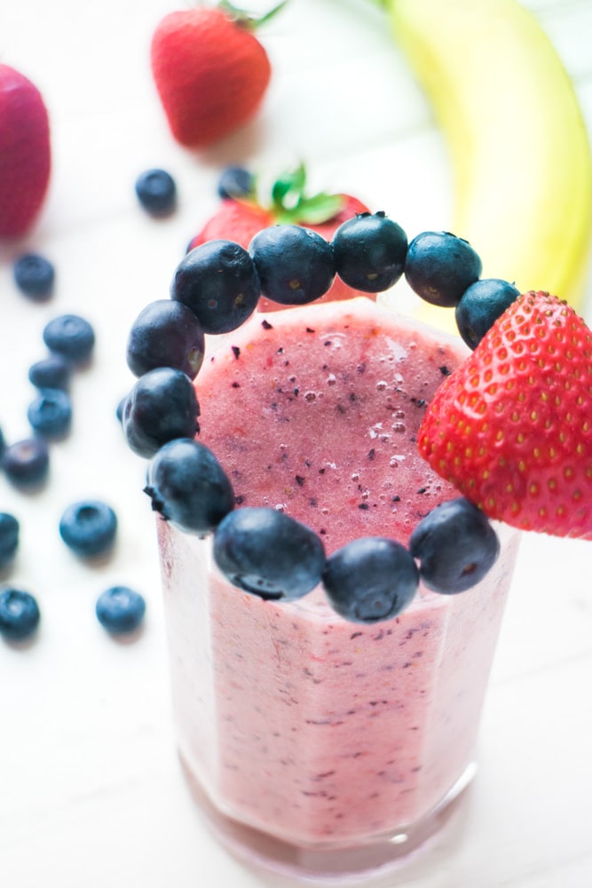 strawberry banana smoothie in glass.