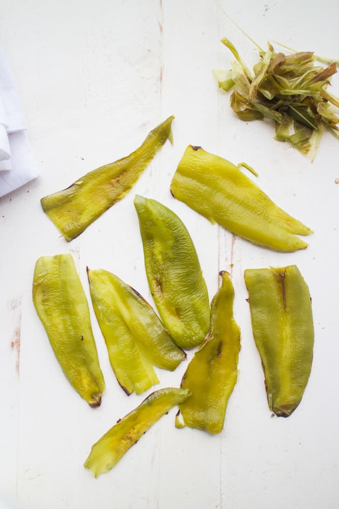 How to make DICED GREEN CHILES - just like the canned version you buy in the supermarket! SO EASY step by step instructions to make homemade green chiles! Perfect idea for your garden Anaheim peppers! Serve immediately, freeze or can them!