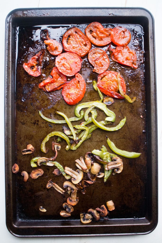 roasted vegetables on baking sheet.