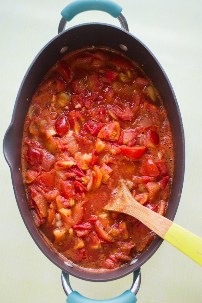 Roma Tomato Sauce recipe that requires no peeling or blanching! This is a easy creamy sauce that's perfect for growing garden tomatoes! Serve on pasta, or use later by canning or freezing.