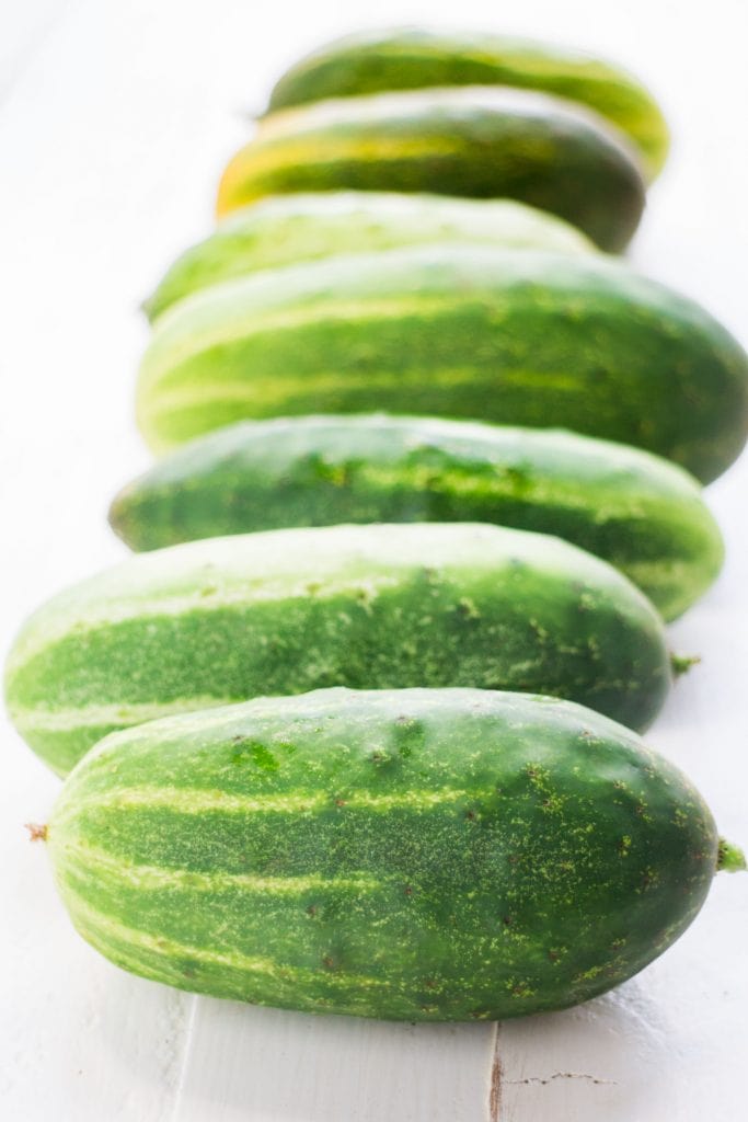 cucumbers on white table