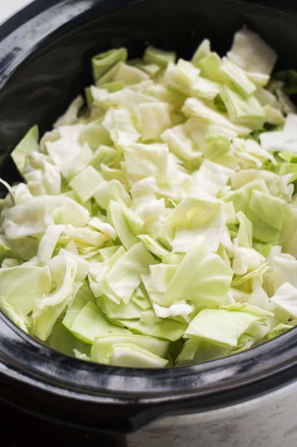 chopped cabbage in slow cooker.