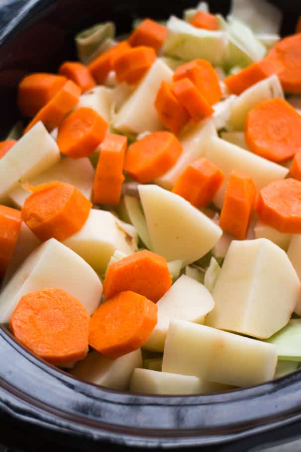 chopped vegetables in slow cooker.