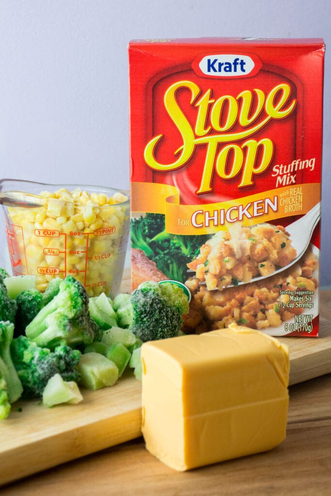 stove top, cheese and frozen vegetables on table.