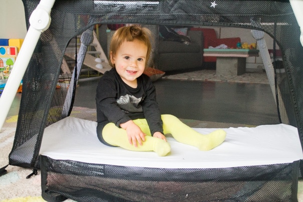 Real Mom Review of the Lotus Travel Crib, the lightweight pack and play that makes flying and airports so easy!  Great for toddlers and babies!  Trust me you need this!