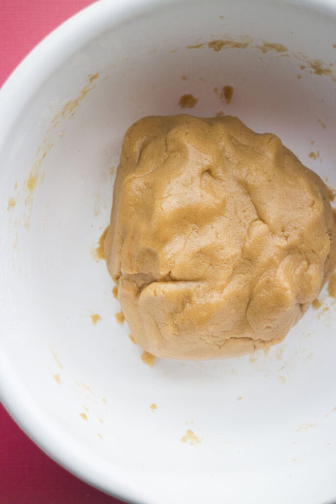 peanut butter cookie dough in bowl.