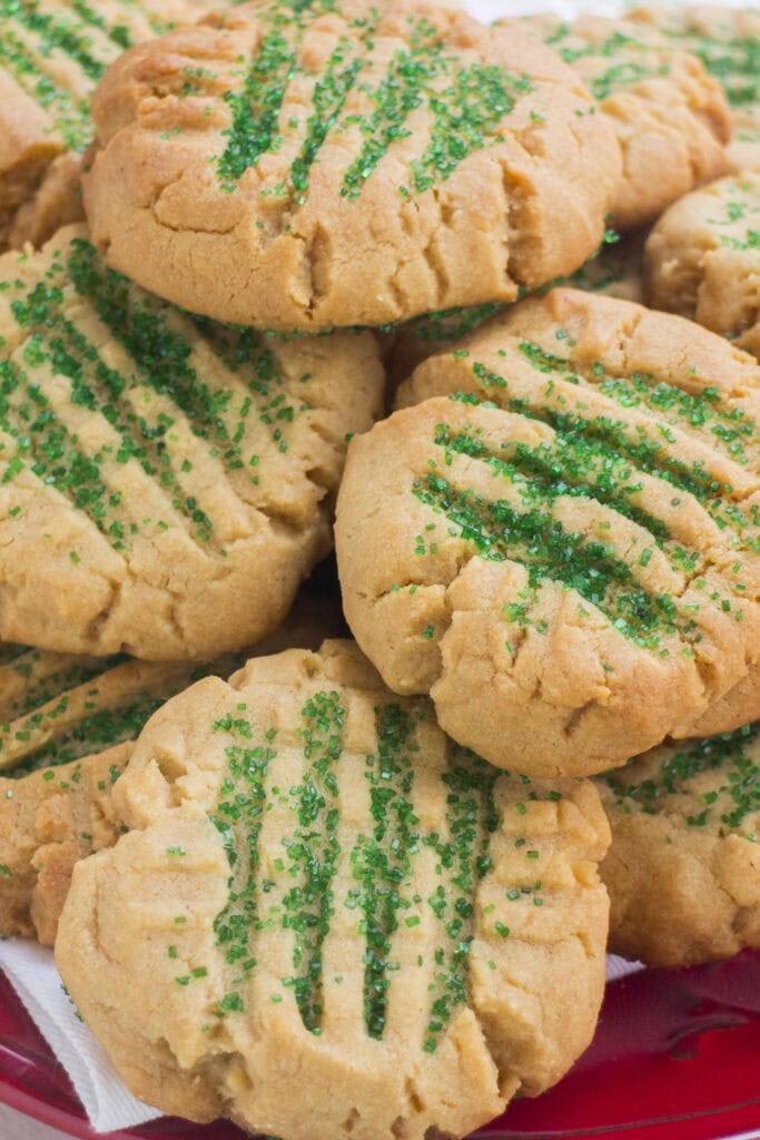 closeup of peanut butter sugar cookies on plate.