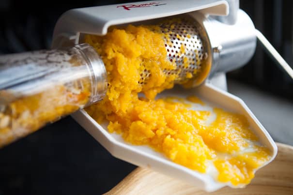 pumpkin puree coming out of food strainer