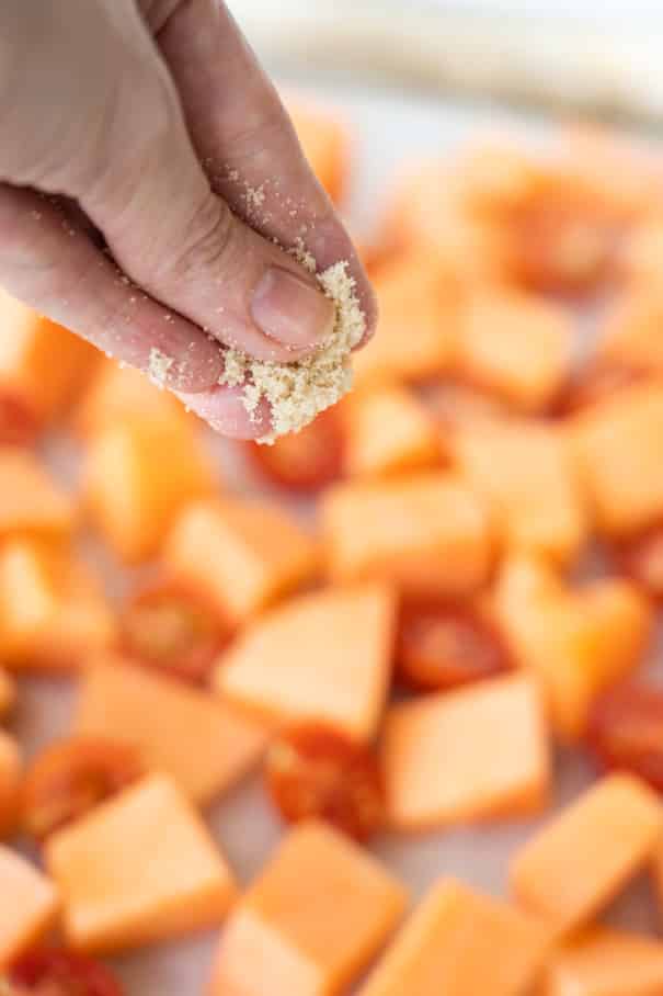 Healthy Roasted Cantaloupe Salad recipe made in 30 minutes.  It's an easy savory and sweet melon tomato salad! I love this recipe for our garden Summer fruit!  This salad is vegetarian, vegan and gluten free. 