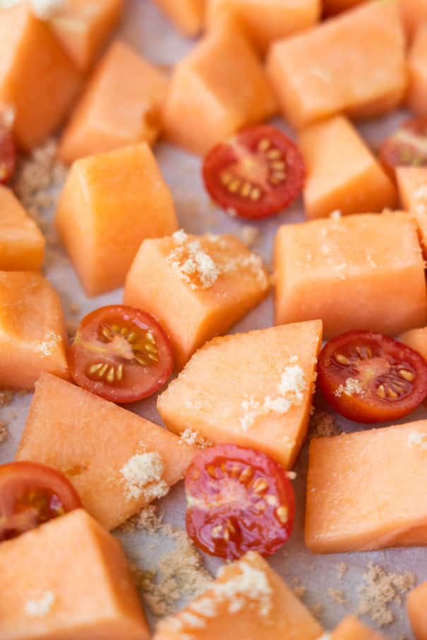 Healthy Roasted Cantaloupe Salad recipe made in 30 minutes.  It's an easy savory and sweet melon tomato salad! I love this recipe for our garden Summer fruit!  This salad is vegetarian, vegan and gluten free. 