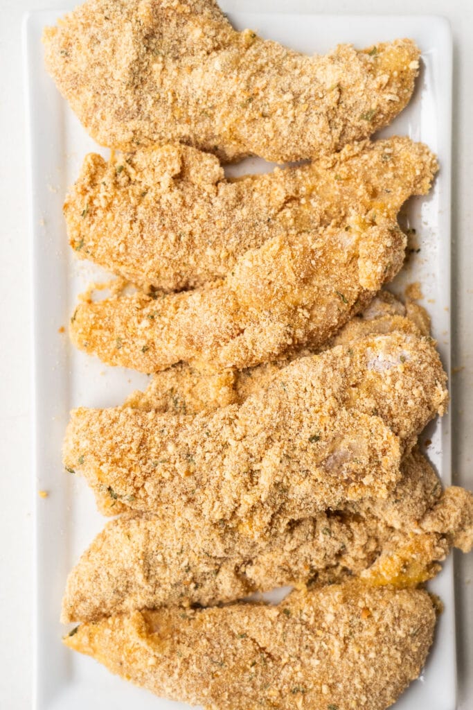 chicken with italian bread crumbs on top.