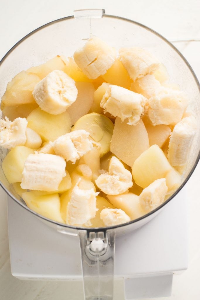 apple, bananas and pears in food processor