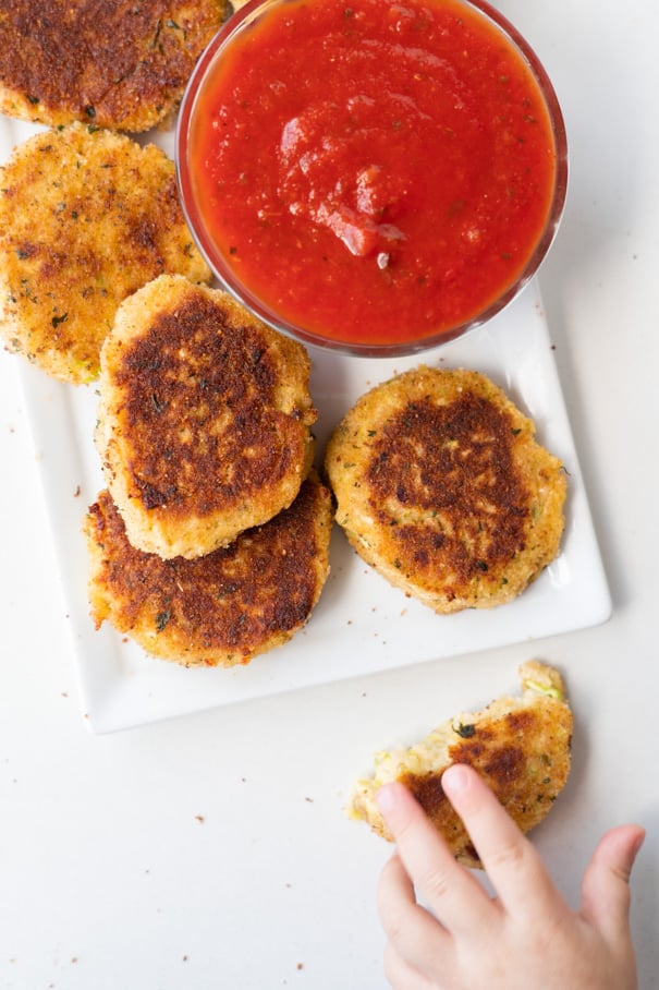 EASY to make zucchini tots recipe that your family is going to love - even your picky toddler! These healthy nuggets are ready in less than 20 minutes total and are 136 calories a serving. Low carb and keto recipe! 