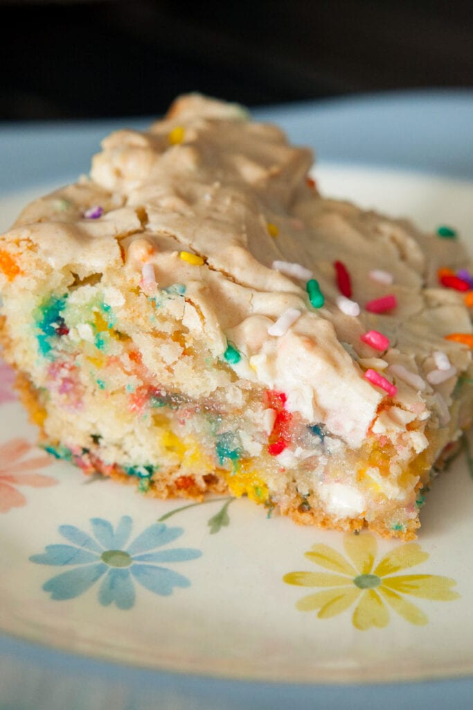 fudgy cake batter brownie on plate.