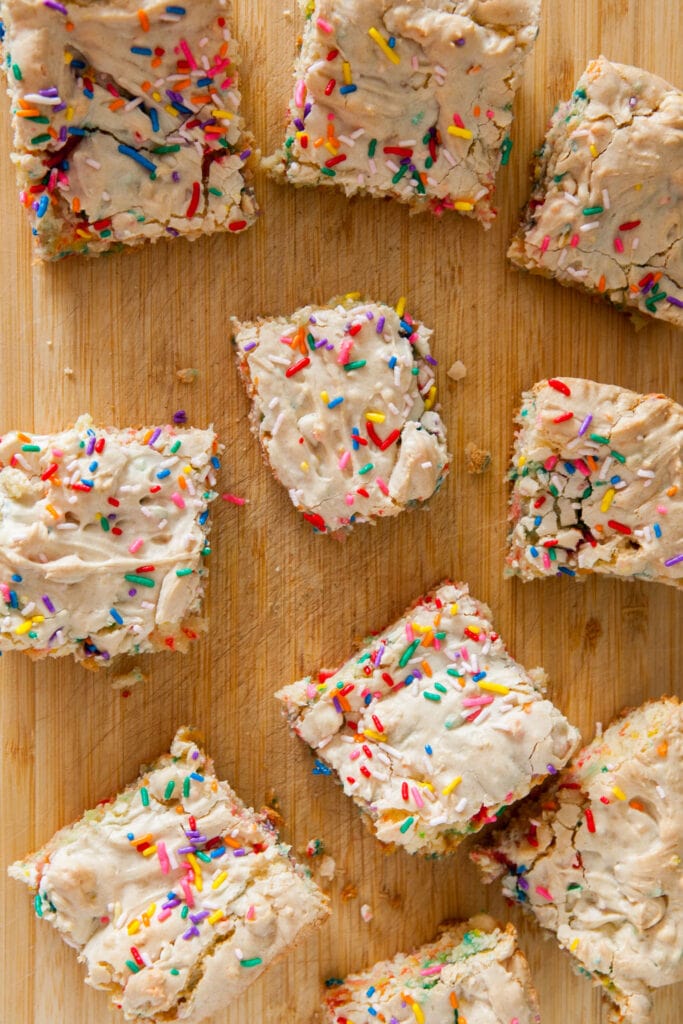 cake batter brownie squares on cutting board.
