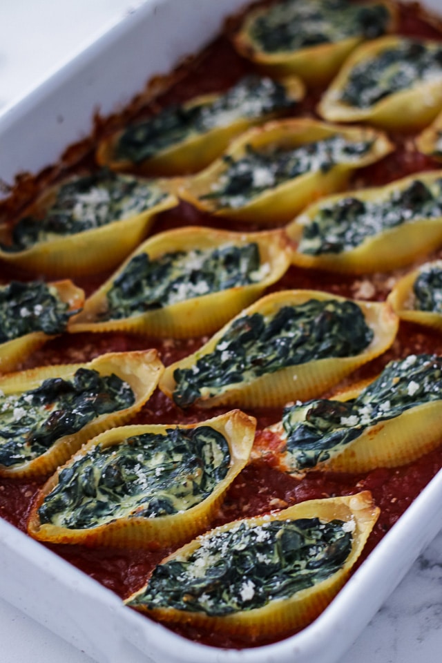 https://brooklynfarmgirl.com/wp-content/uploads/2019/05/Jumbo-Shells-Stuffed-with-Ricotta-and-Spinach-in-a-Large-Rectangular-Casserole-Dish.jpg