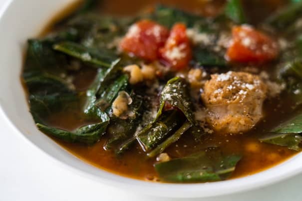 Italian Sausage Soup with collard greens, white beans and diced tomatoes. Your entire family is going to love this easy to make hearty soup, and even better it's only 180 calories a serving!  This creamy soup is dairy free, keto and low carb. 