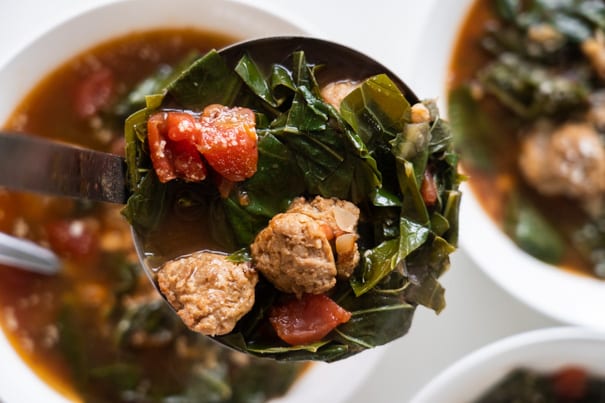 Italian Sausage Soup with collard greens, white beans and diced tomatoes. Your entire family is going to love this easy to make hearty soup, and even better it's only 180 calories a serving!  This creamy soup is dairy free, keto and low carb. 