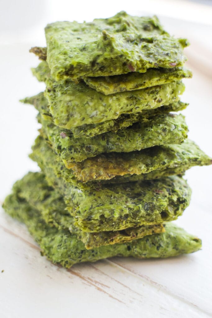 kale crackers stacked on top of each other.