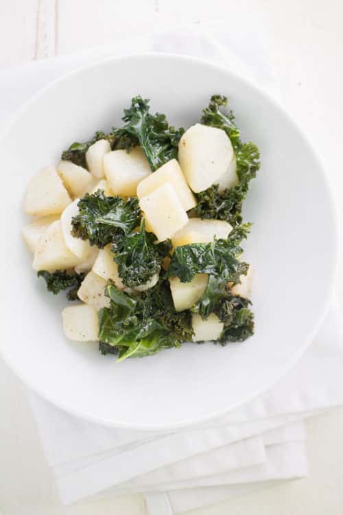 This easy recipe for Simple Potato Kale Salad is one of my favorite healthy meals or side dishes. The ingredients are straightforward: potatoes, kale, and olive oil – that’s it! Paleo, Whole30-compliant, and vegan friendly.