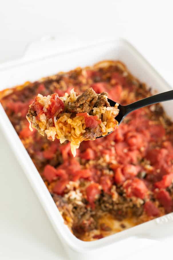 Cabbage Roll Casserole has all the same flavor as classic baked cabbage rolls, but with way less work! This unstuffed cabbage roll casserole combines layers of meat, rice, tomatoes and cabbage for an easy adaptation of the classic cabbage roll that is perfect for a busy weeknight meal!