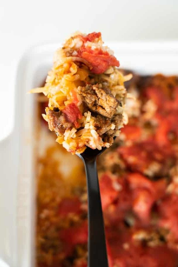 Cabbage Roll Casserole has all the same flavor as classic baked cabbage rolls, but with way less work! This unstuffed cabbage roll casserole combines layers of meat, rice, tomatoes and cabbage for an easy adaptation of the classic cabbage roll that is perfect for a busy weeknight meal!