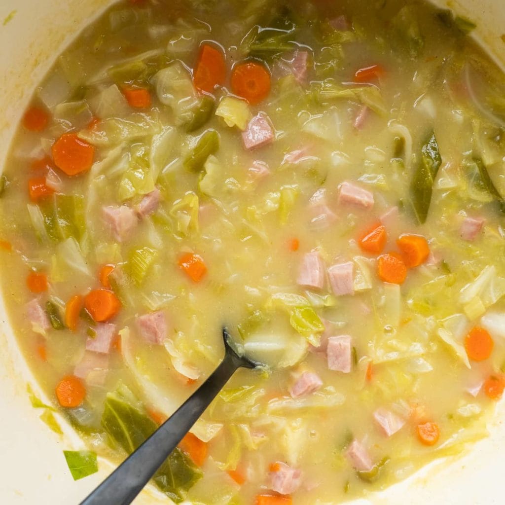 This healthy ham and cabbage soup is a mix of carrots, celery, bell pepper, onion, cabbage and ham, all simmered together in a savory broth. A quick and easy comforting meal that’s full of flavor!