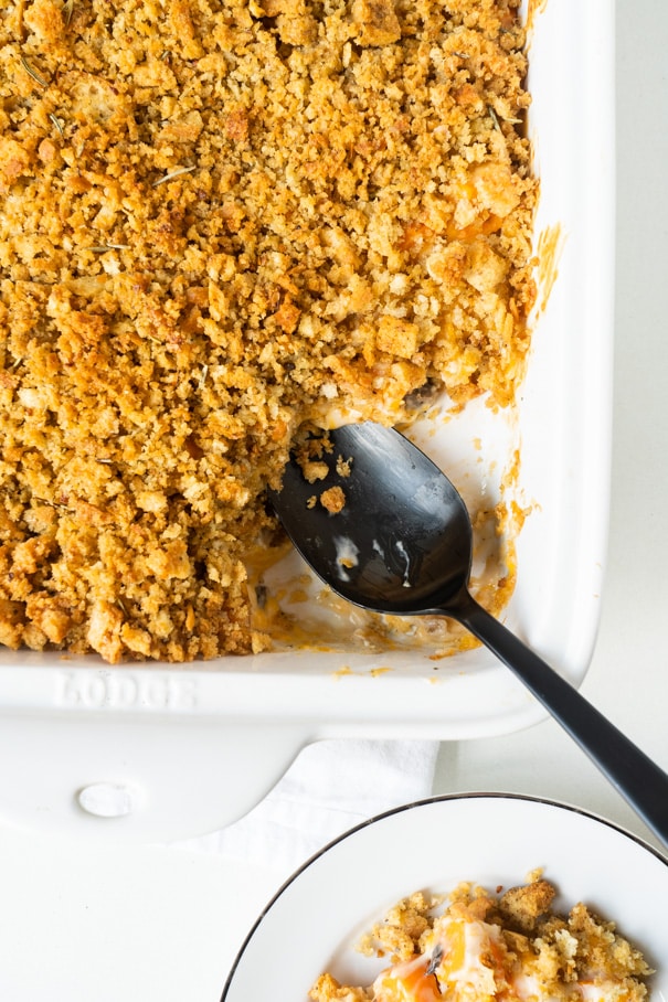 This Carrot Casserole is a super easy one-pot meal that combines tender carrot coins with cream of mushroom soup and cheese and is topped with a buttery herbed stuffing. A tasty and inexpensive side dish that’s perfect for a holiday meal or an everyday dinner.