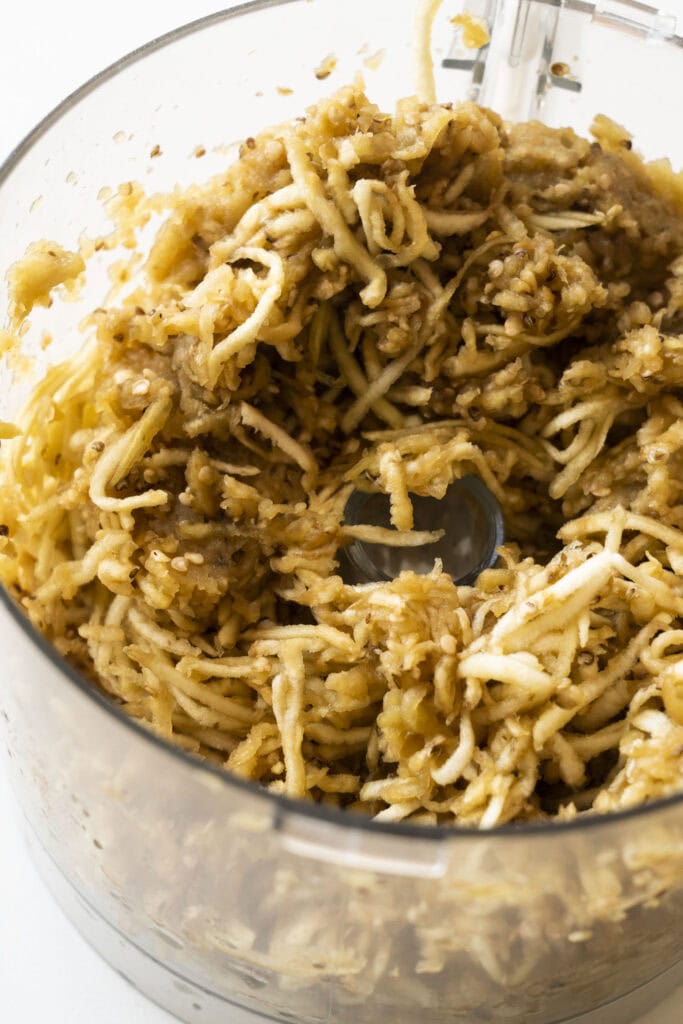 shredded eggplant in food processor.